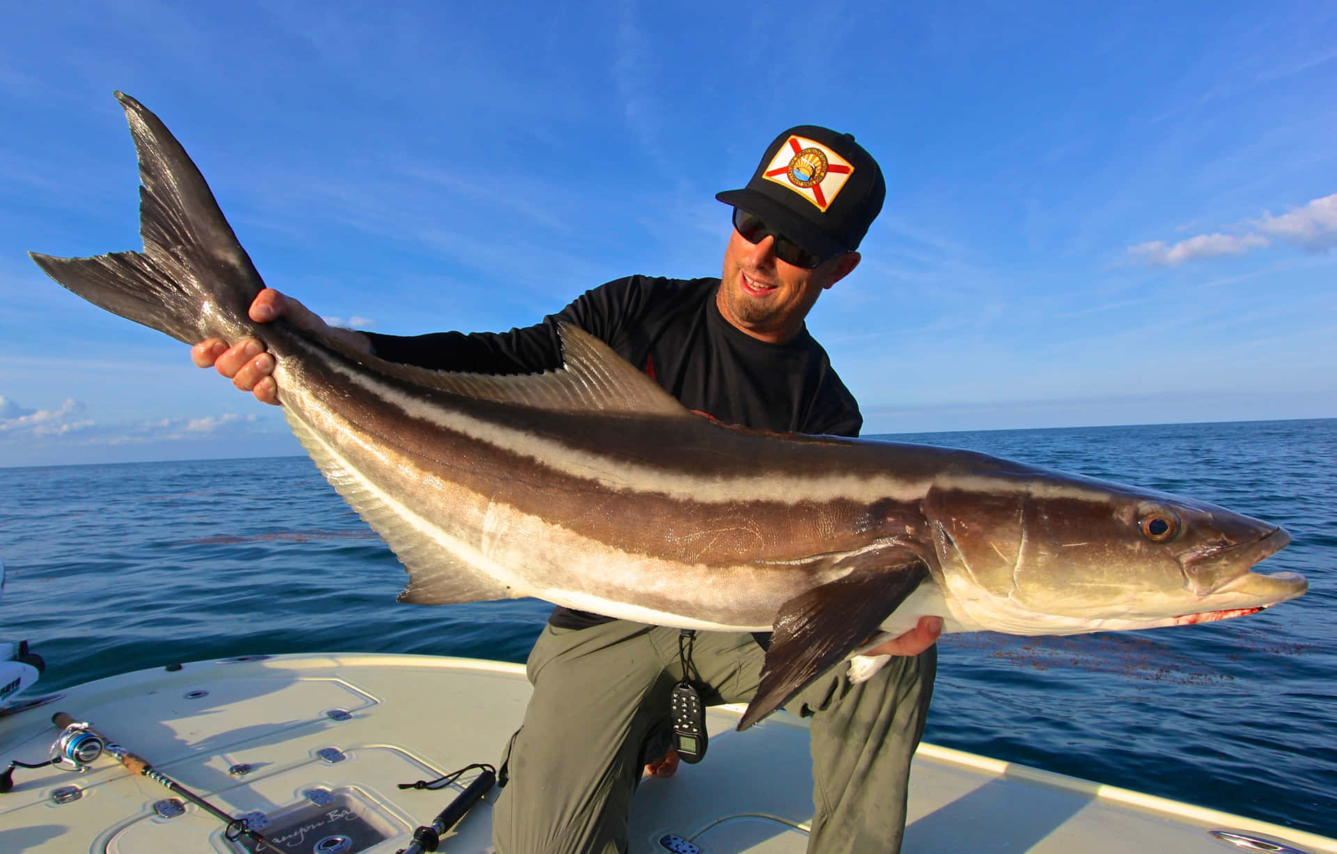 Anglerwith Caught Cobia Wallpaper