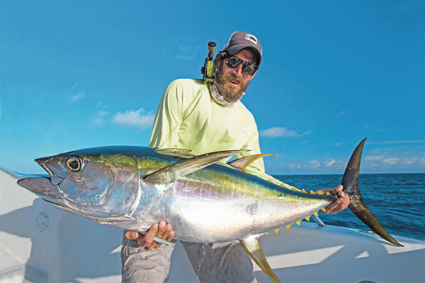 Anglerwith Yellowfin Tuna Catch Wallpaper