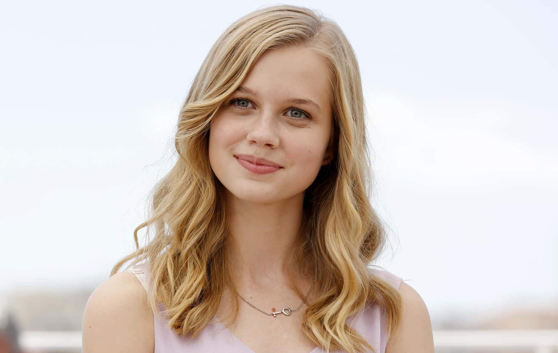 Angourie Rice Smiling Outdoors Wallpaper