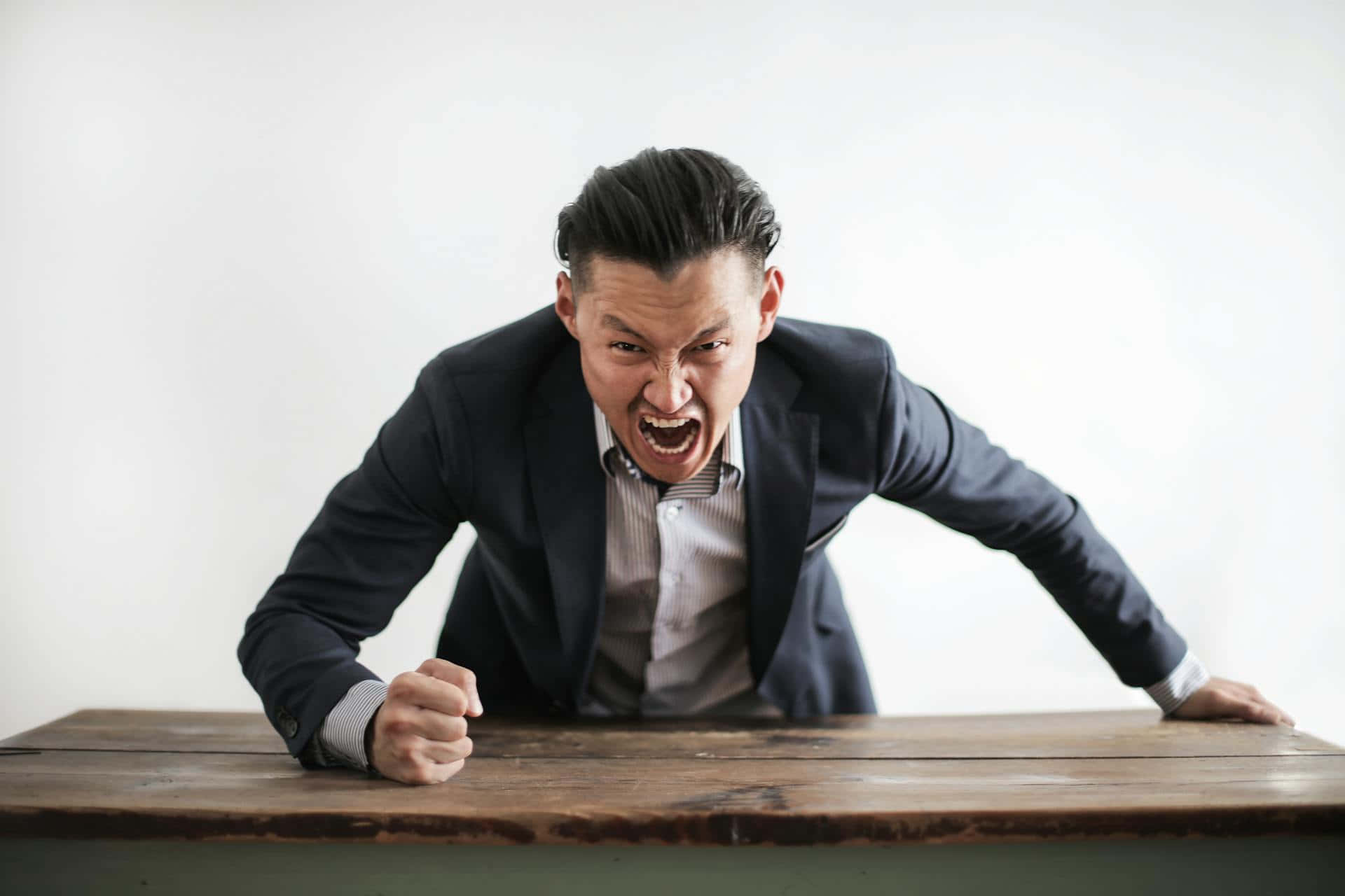 Angry Businessman Yelling Wallpaper