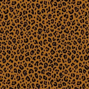 Enbrun Och Svart Leopardtryckt Tyg Wallpaper