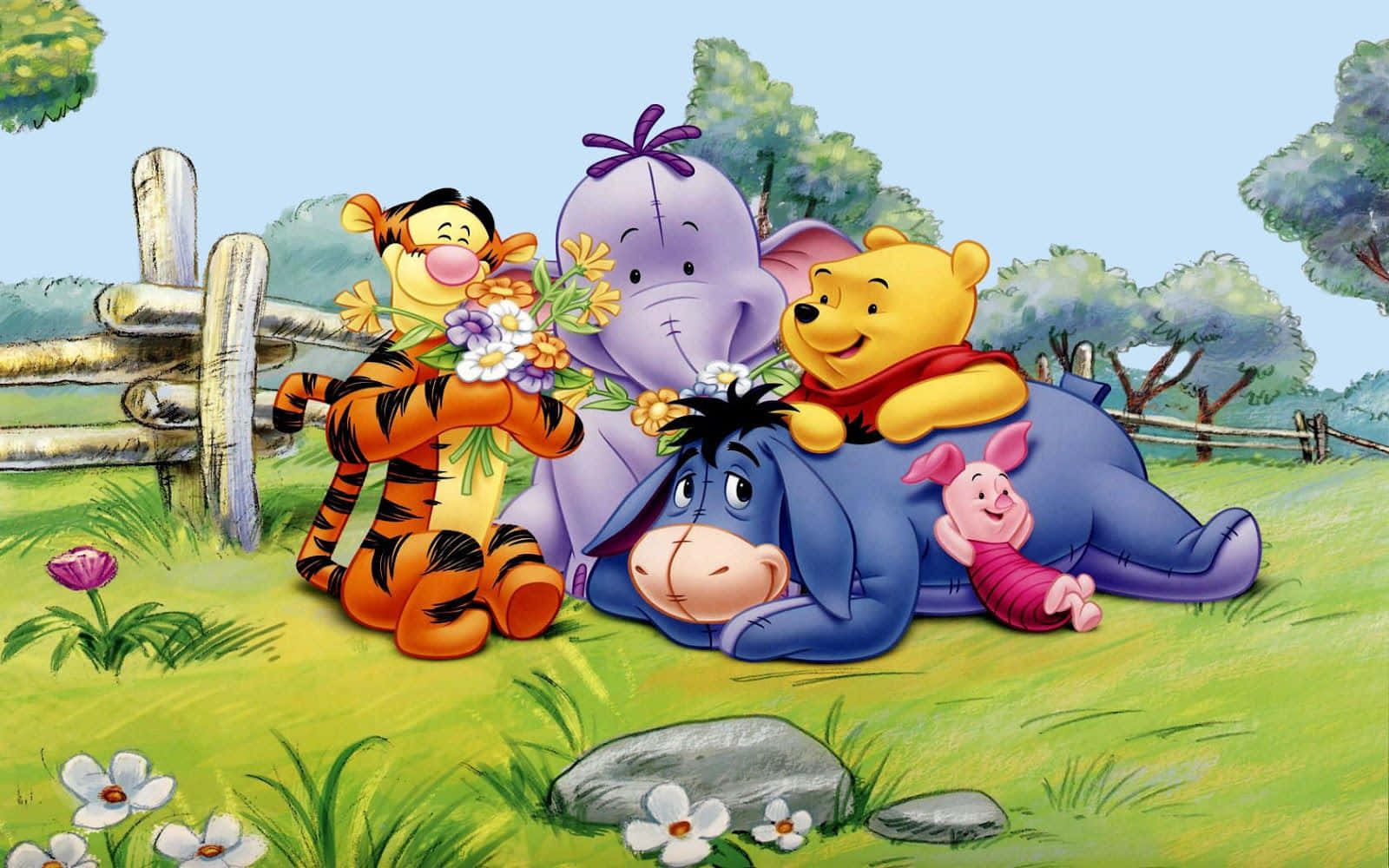 Winnie The Pooh And Friends Are Sitting In A Field