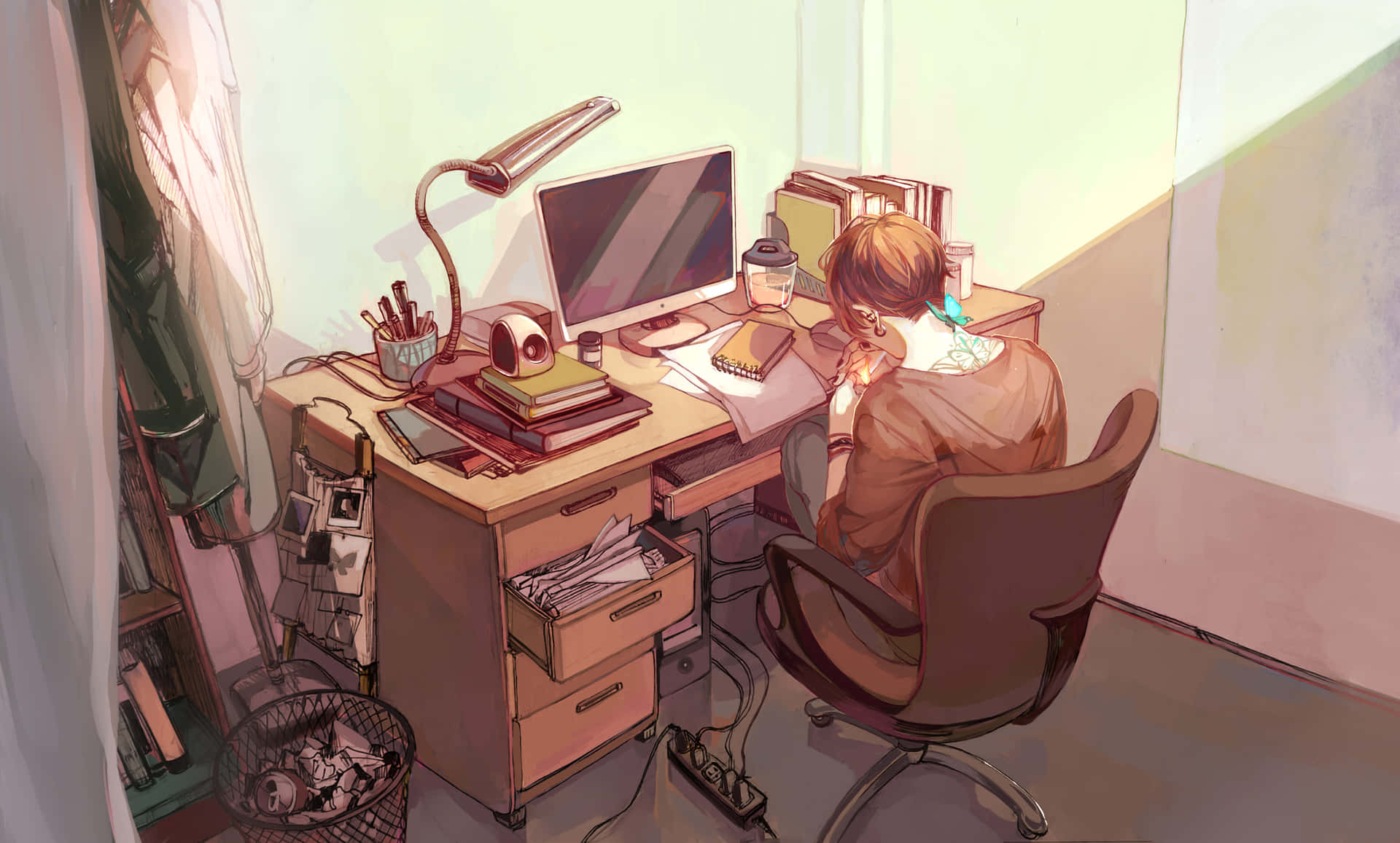 A Young Boy Working on His Computer with A Background of An Anime Fantasy World Wallpaper