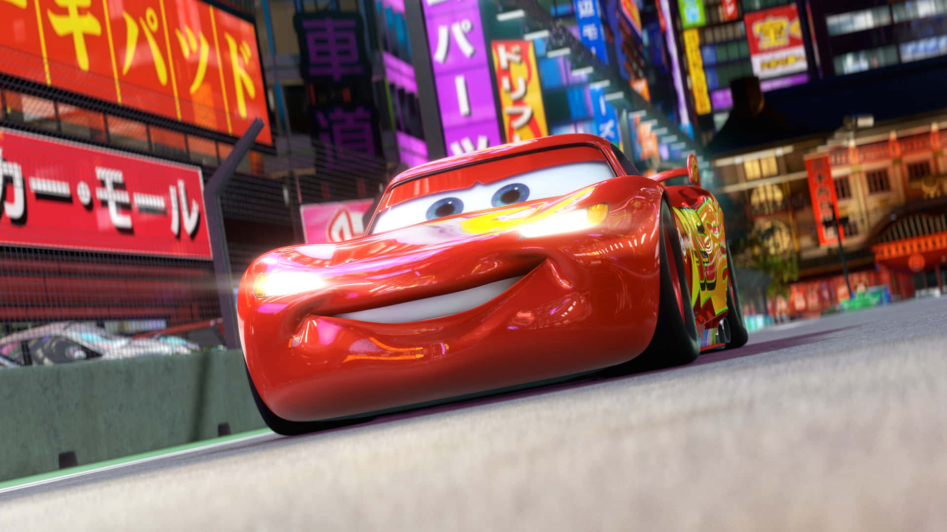 Cars 3 - A Red Car Driving Down A City Street
