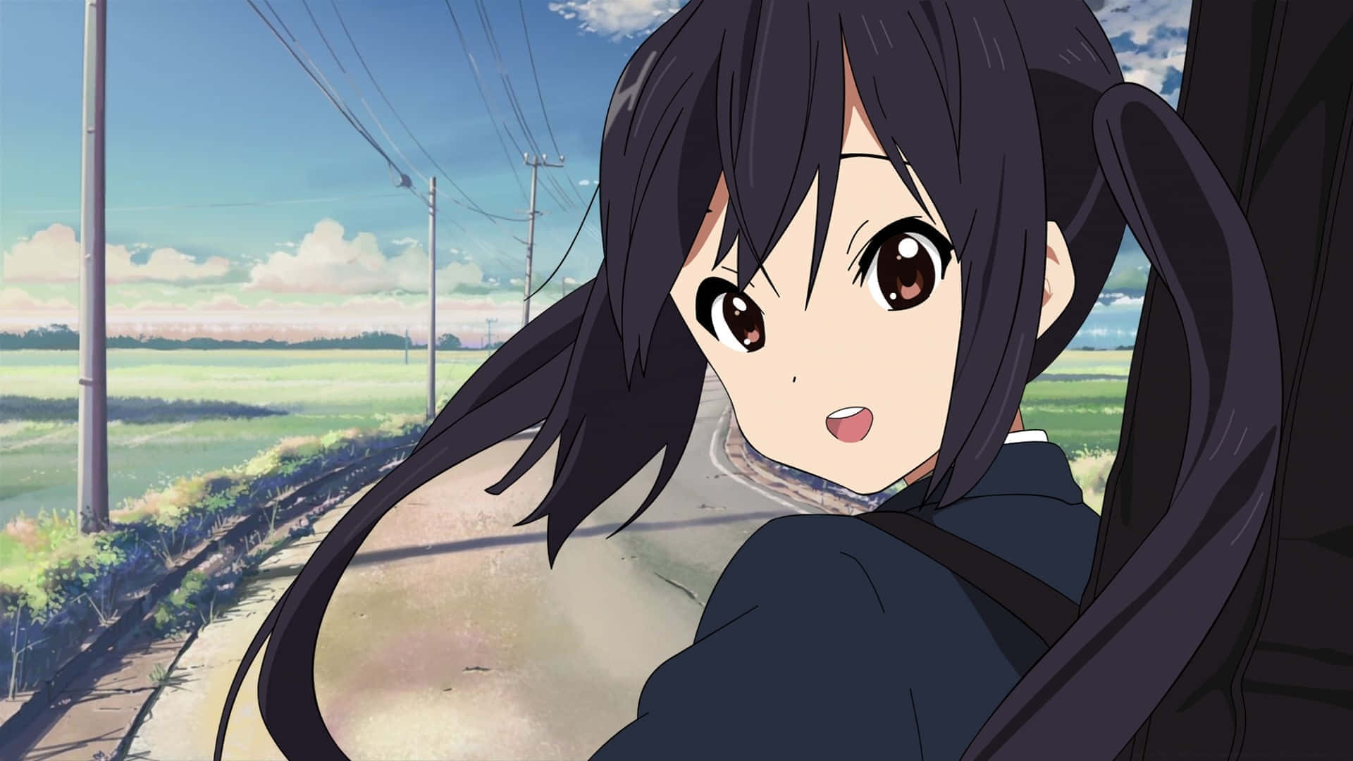 Anime Girl Looking Back Smiling Wallpaper