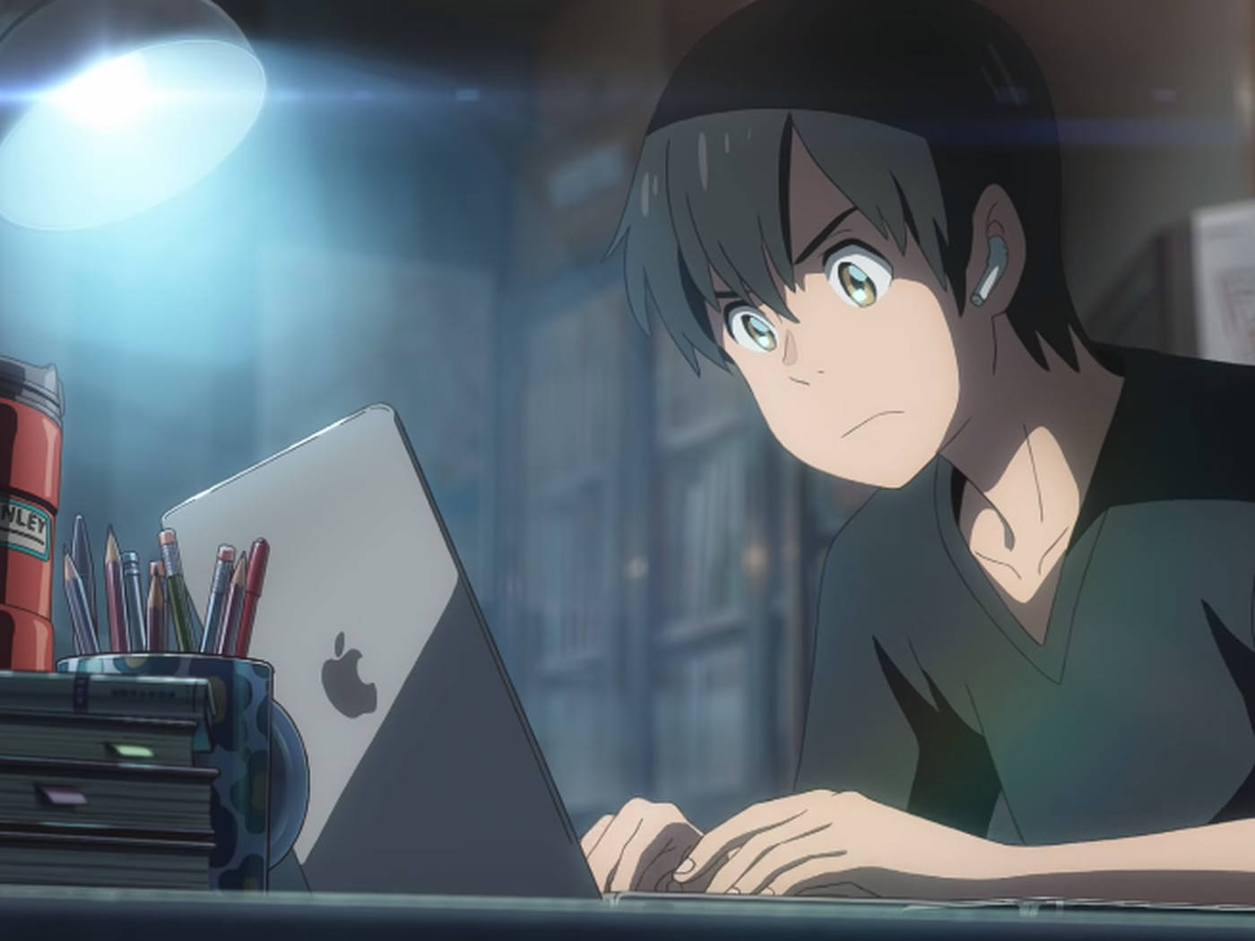 Anime Guy Typing On Macbook Laptop Picture
