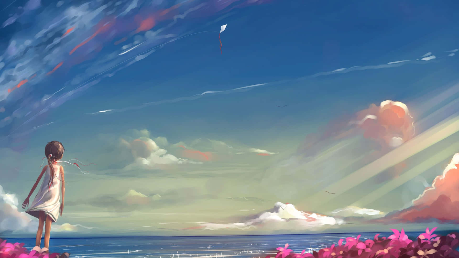 a girl is standing on the beach looking at the sky Wallpaper