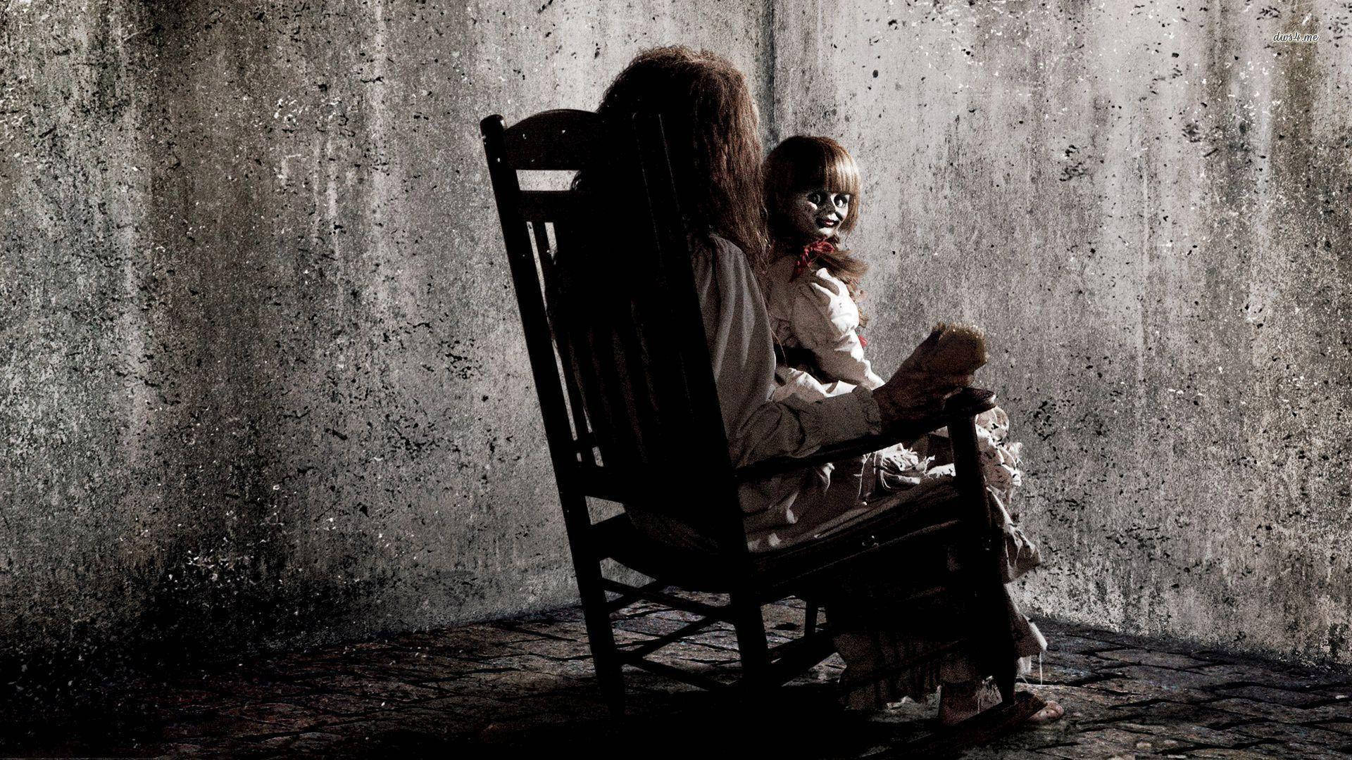 Annabelle And Woman On Chair Background