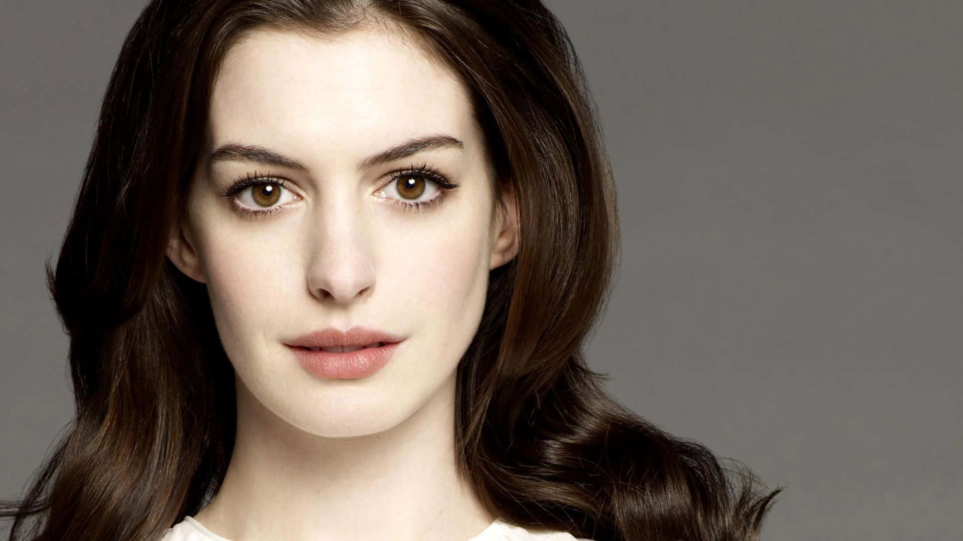 Anne Hathaway radiating beauty and grace.