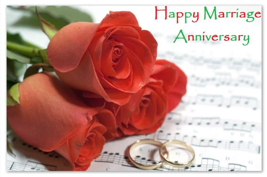 Anniversary With Roses And Wedding Rings Wallpaper