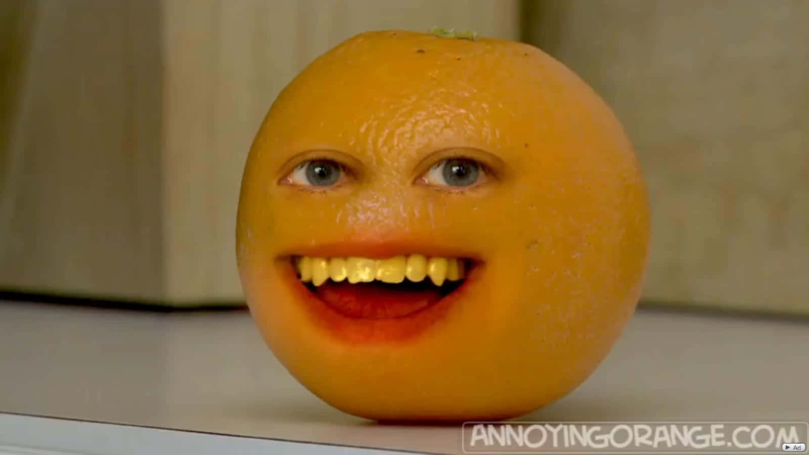 Annoying Orange On A Table Wallpaper