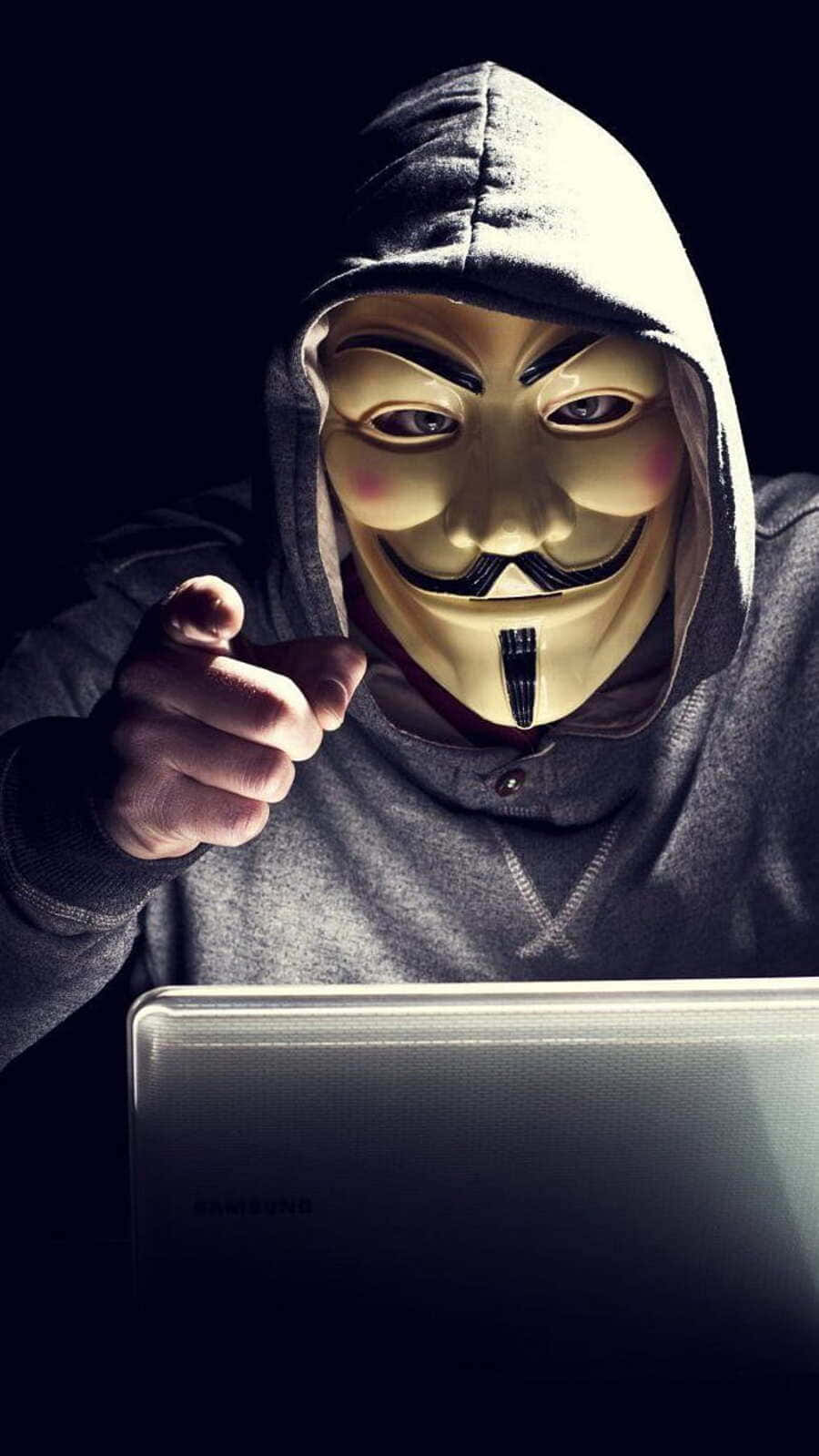 Anonymous Hackerin Hoodie Pointing Wallpaper