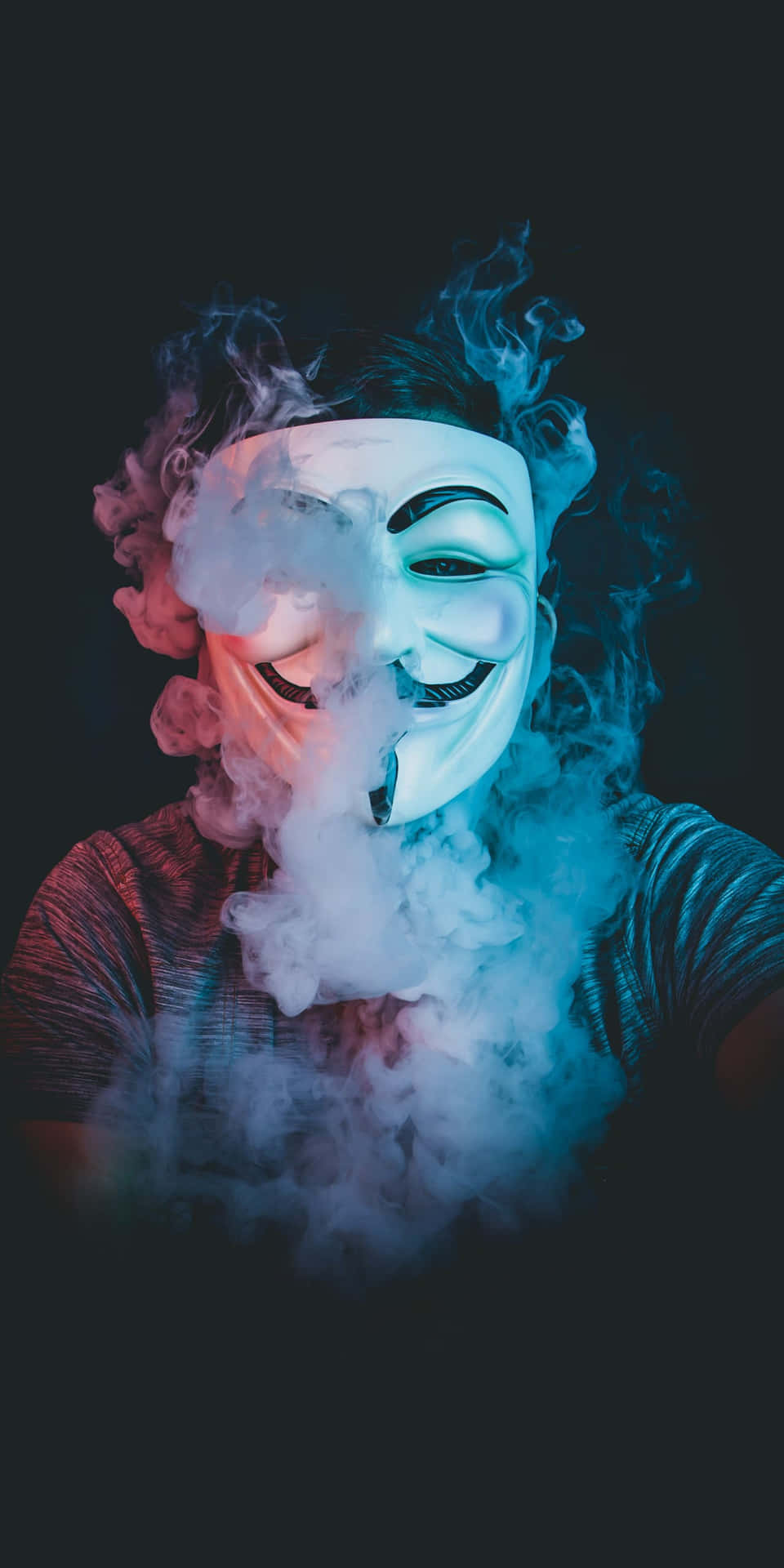 A Man In A Mask Smoking A Cigarette Wallpaper