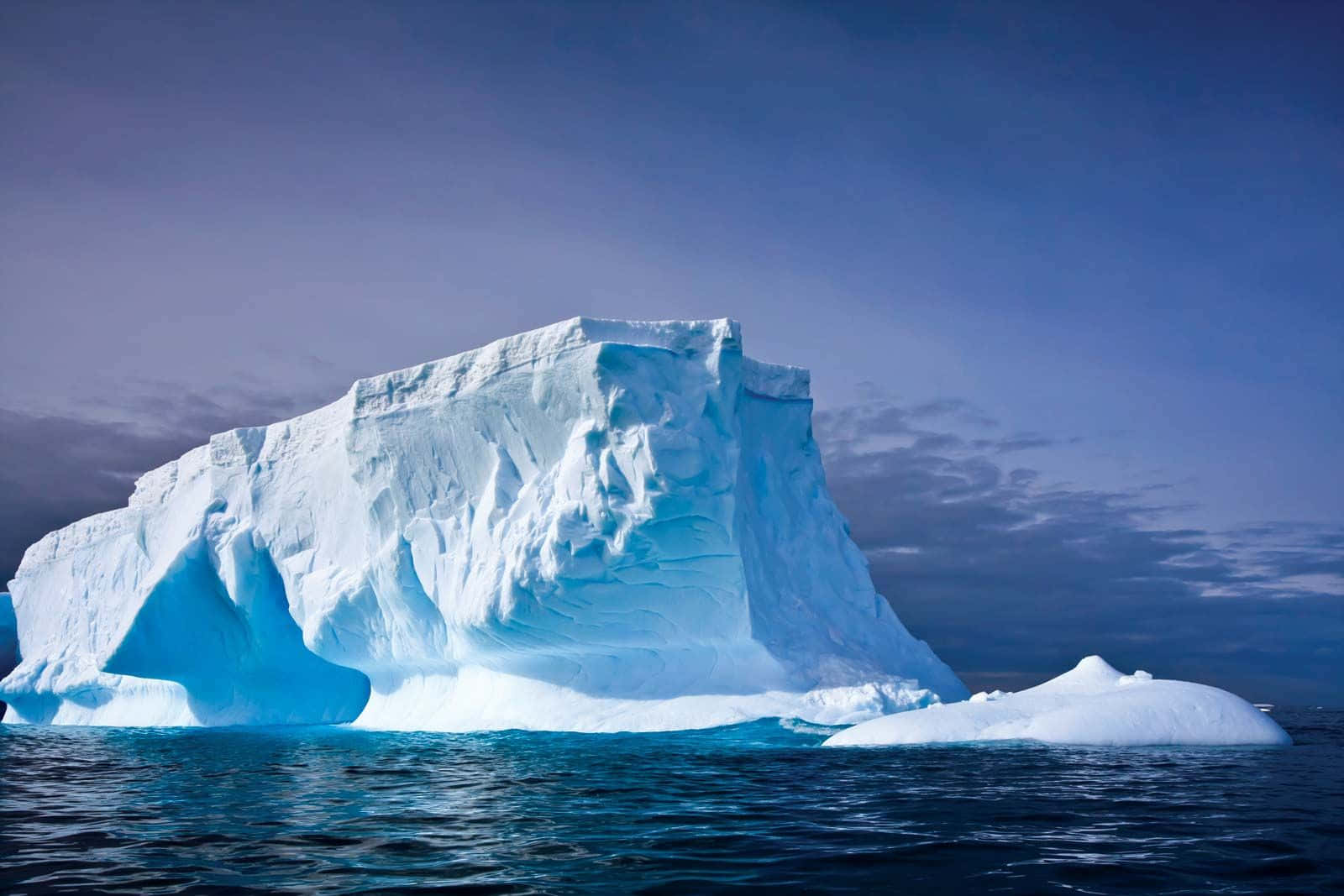 An Iceberg Floating In The Ocean
