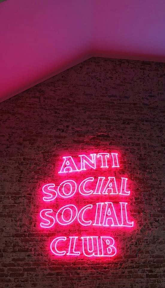 Wallpaperrosa Neon-skylt Från Anti Social Club Iphone-bakgrundsbild. Wallpaper