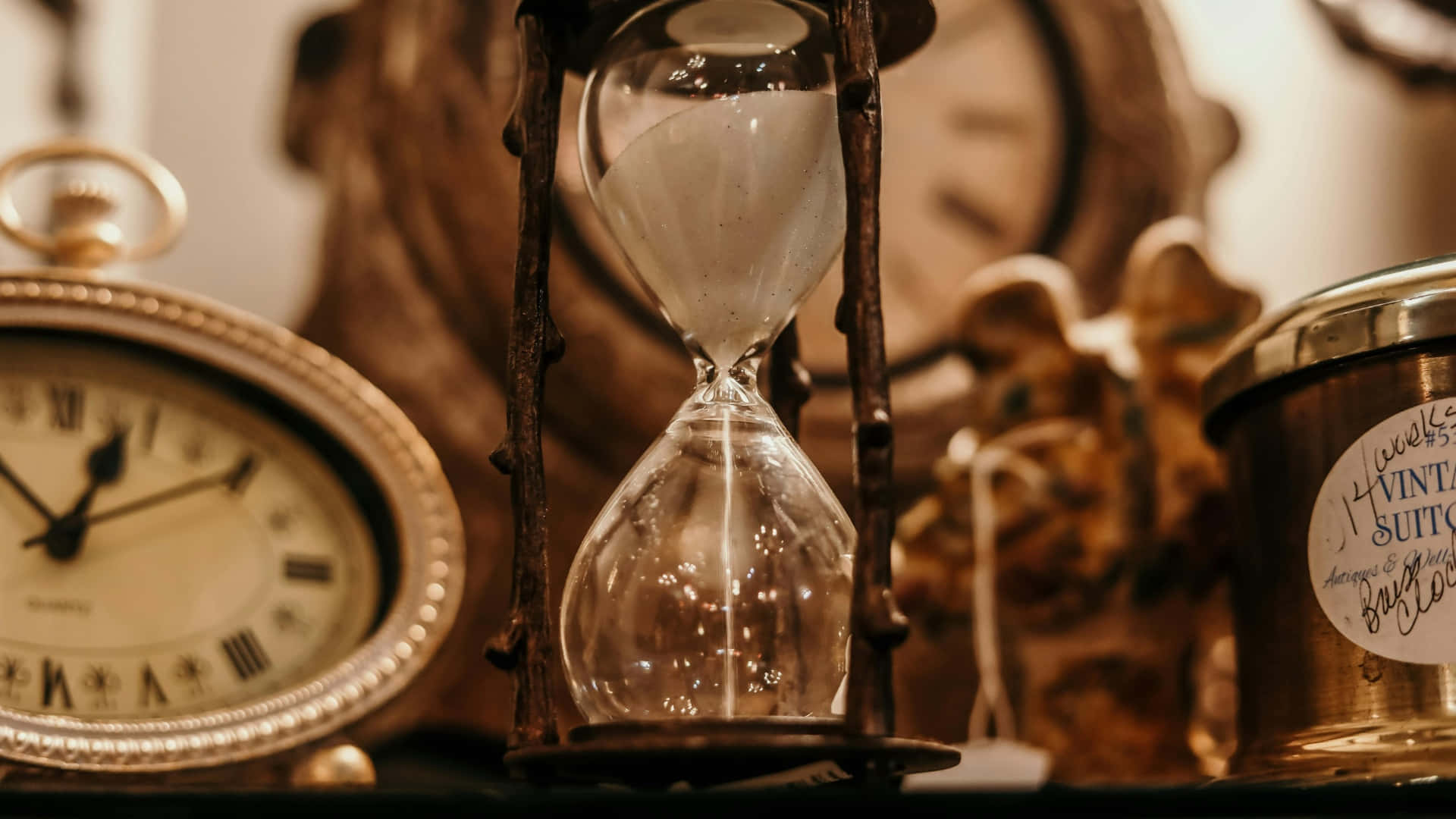Antique Timepieces And Hourglass Wallpaper
