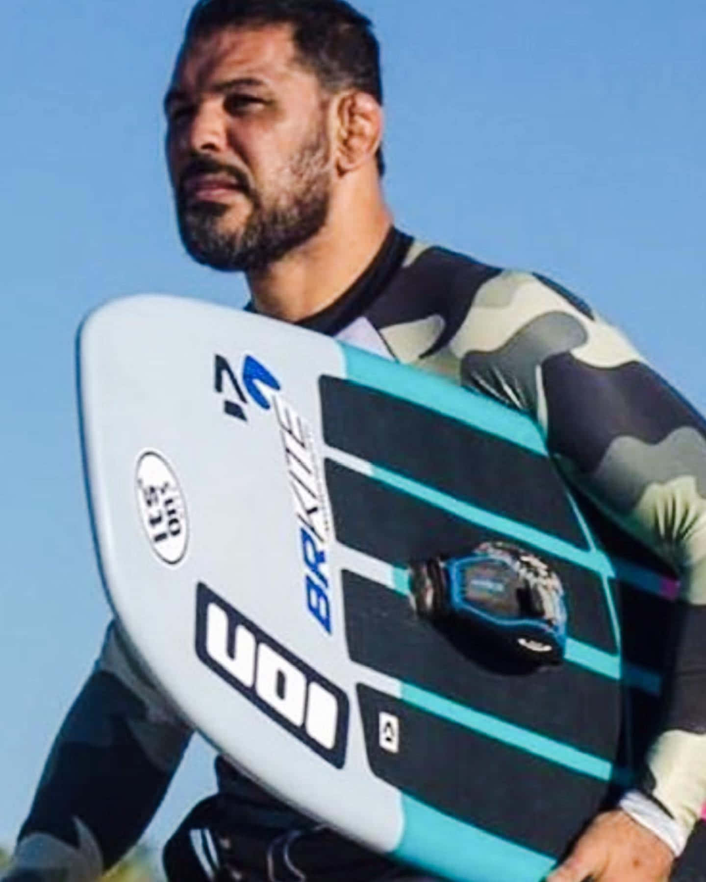 Antônio Rodrigo Nogueira With Surfboard Wallpaper