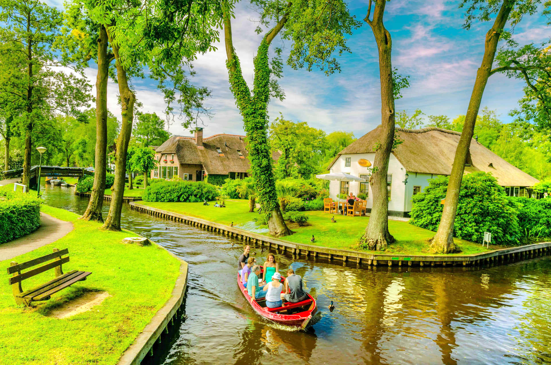 Download Apeldoorn Canal Boat Tour Thatched Roof Houses Wallpaper ...