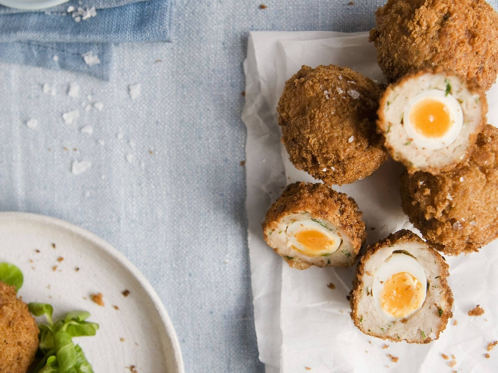 Tempting Scotch Eggs on White Plate Wallpaper