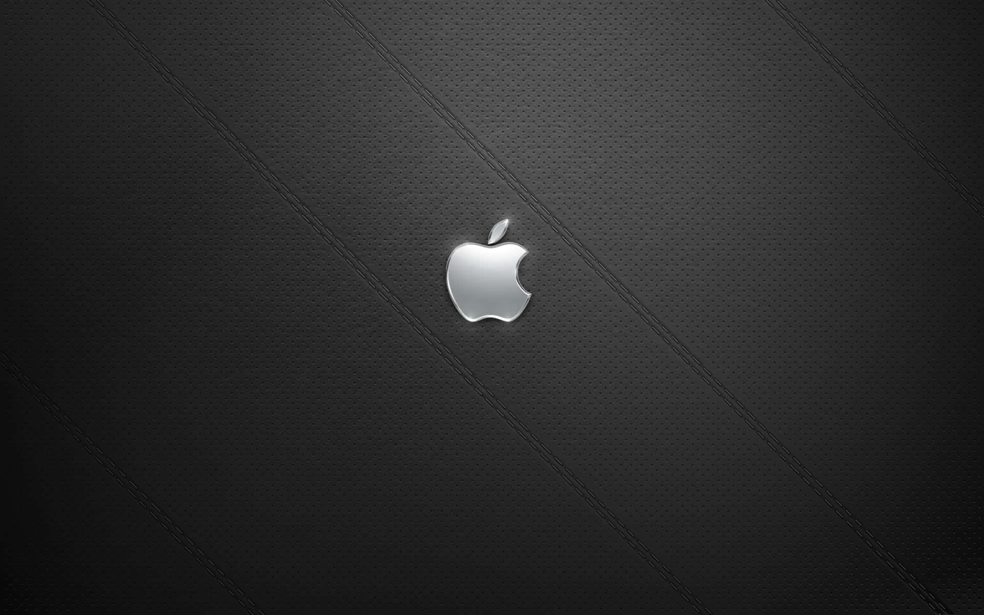 Enbild Av En Silver Apple Desktop Som Är Inställd Med En Bildskärm Och Tangentbord. Wallpaper