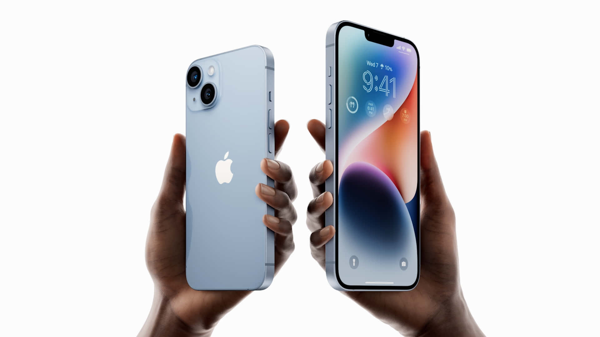 Two Hands Holding An Iphone 11 And An Iphone 12