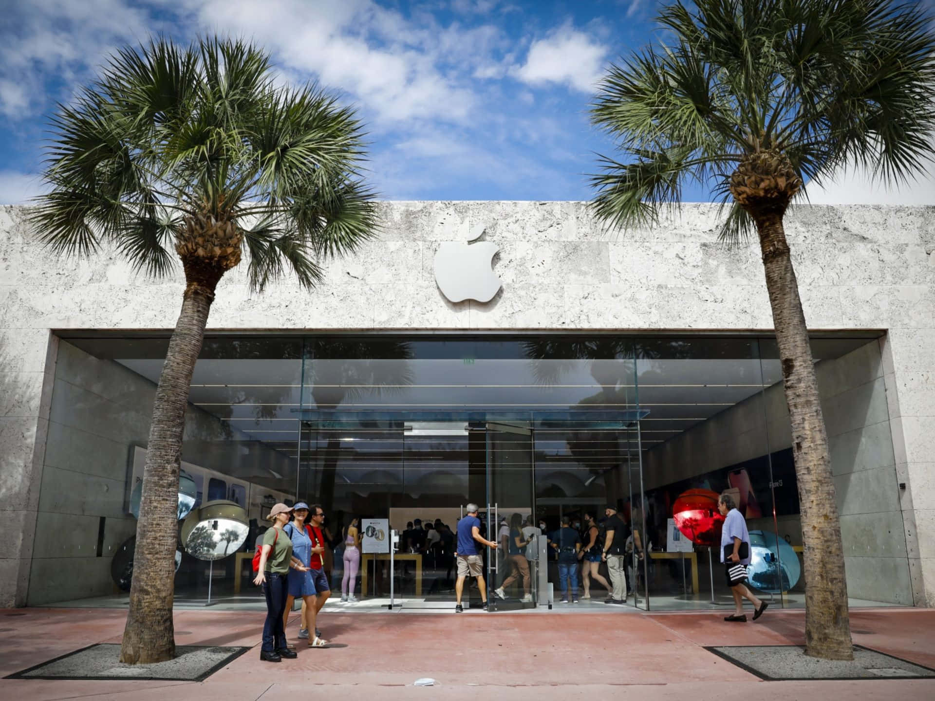 Apple Store Exterior With Customers Wallpaper