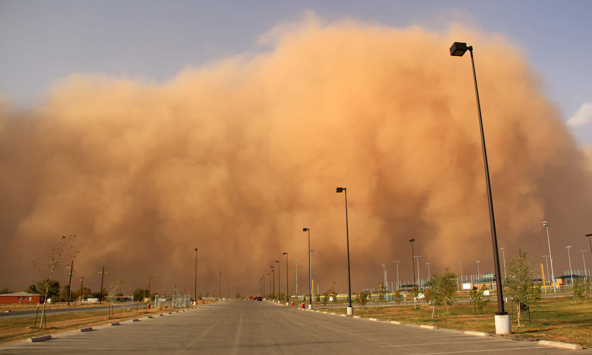 Approaching_ Dust_ Storm_ Over_ City_ Road.jpg Wallpaper
