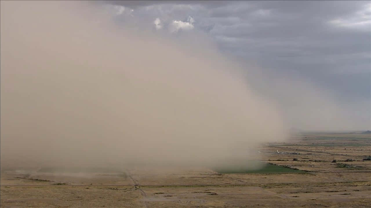 Approaching Dust Storm Over Plains Wallpaper