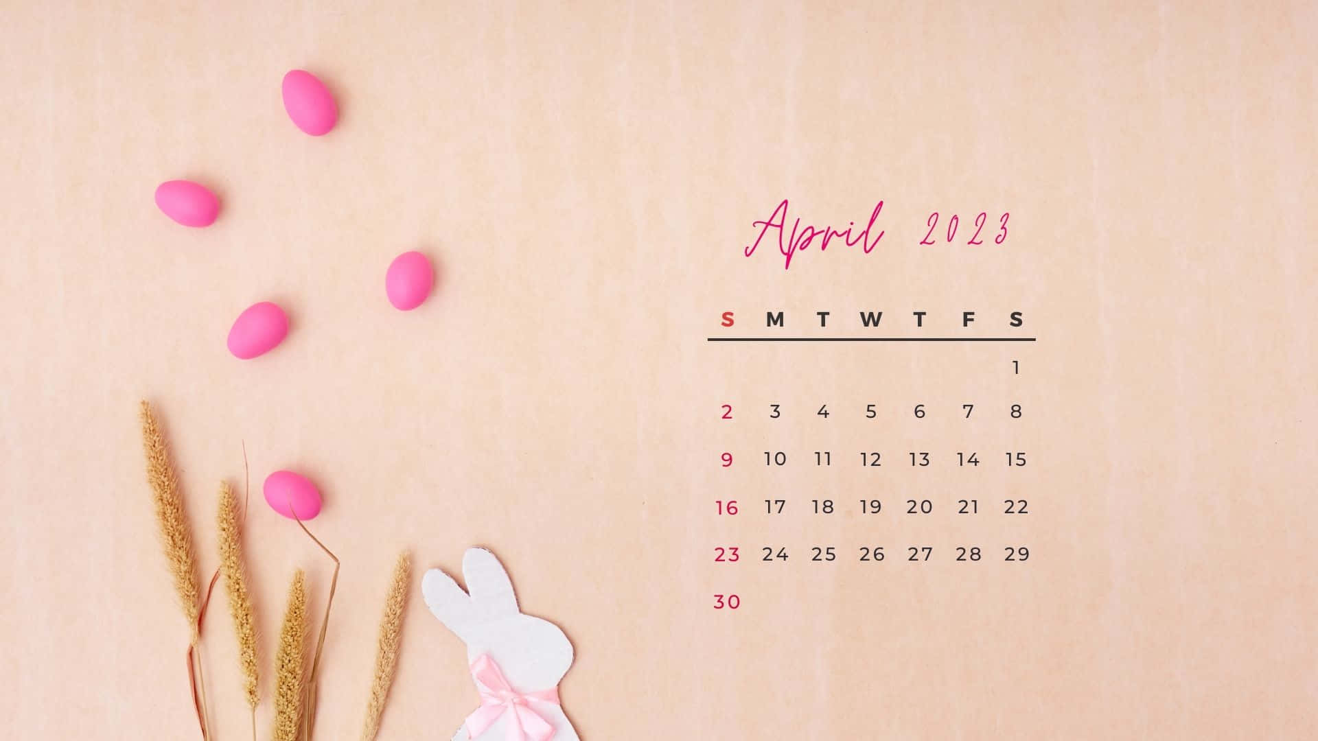 A Calendar With Bunnies And Eggs On A Wooden Background Wallpaper