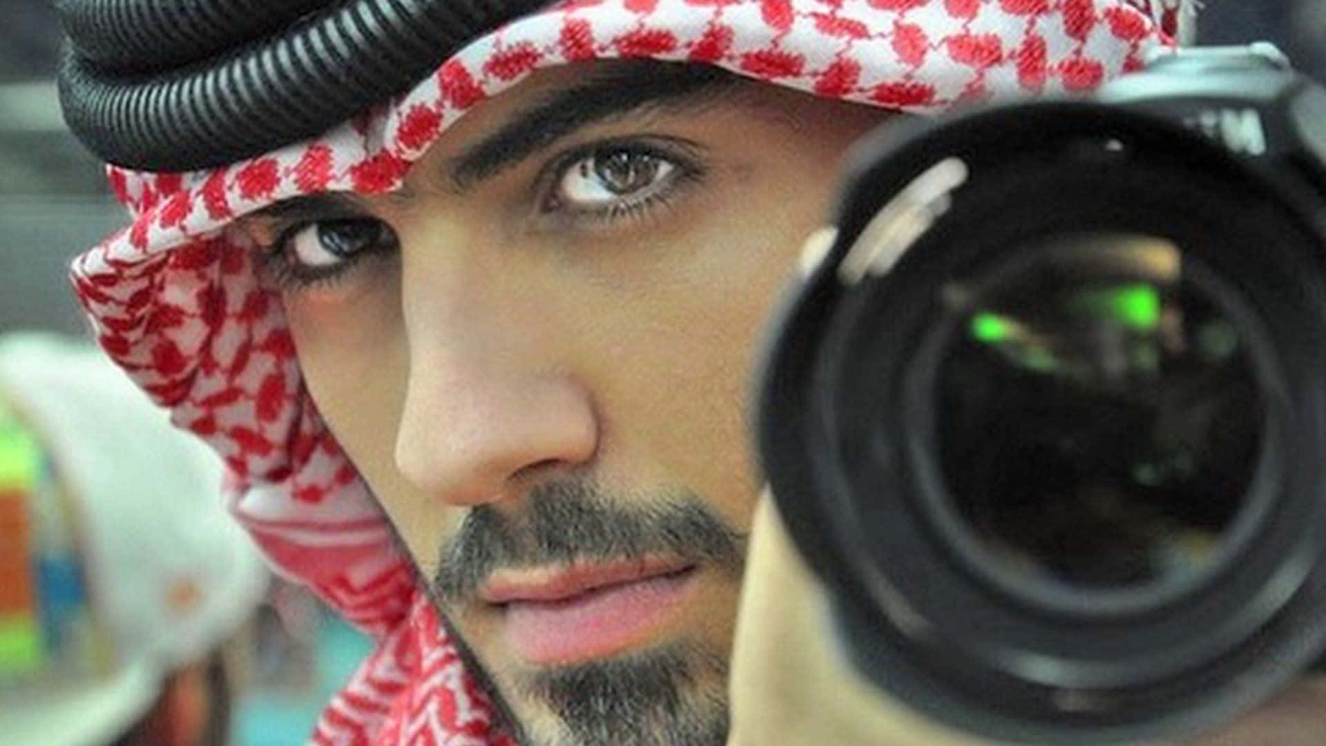 Arab Man With Camera Lens Wallpaper