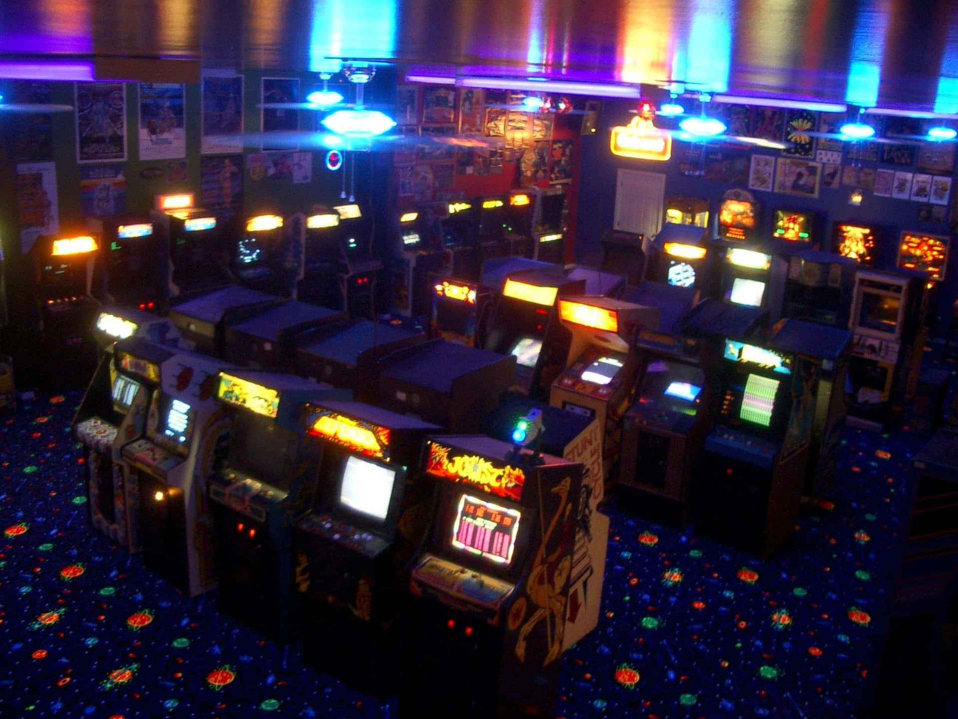 A Room With Many Video Game Machines Wallpaper
