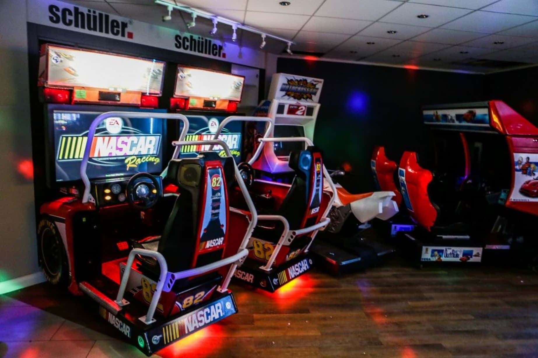 Exciting Arcade Games in Action Wallpaper