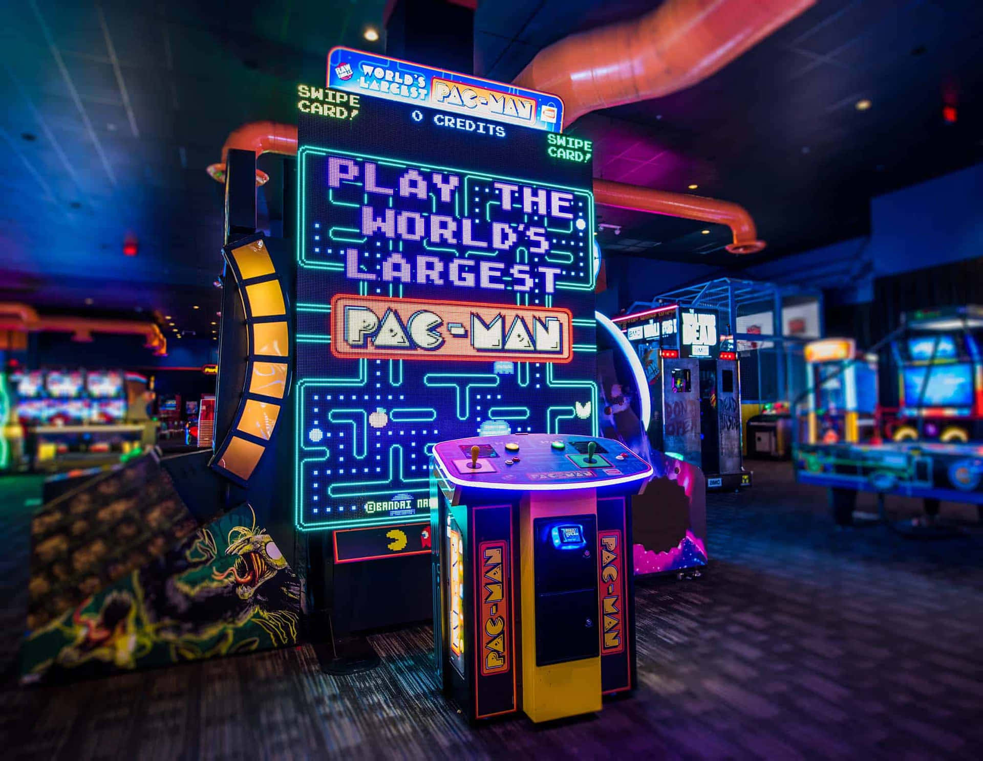 Retro Gaming with a Variety of Arcade Machines Wallpaper