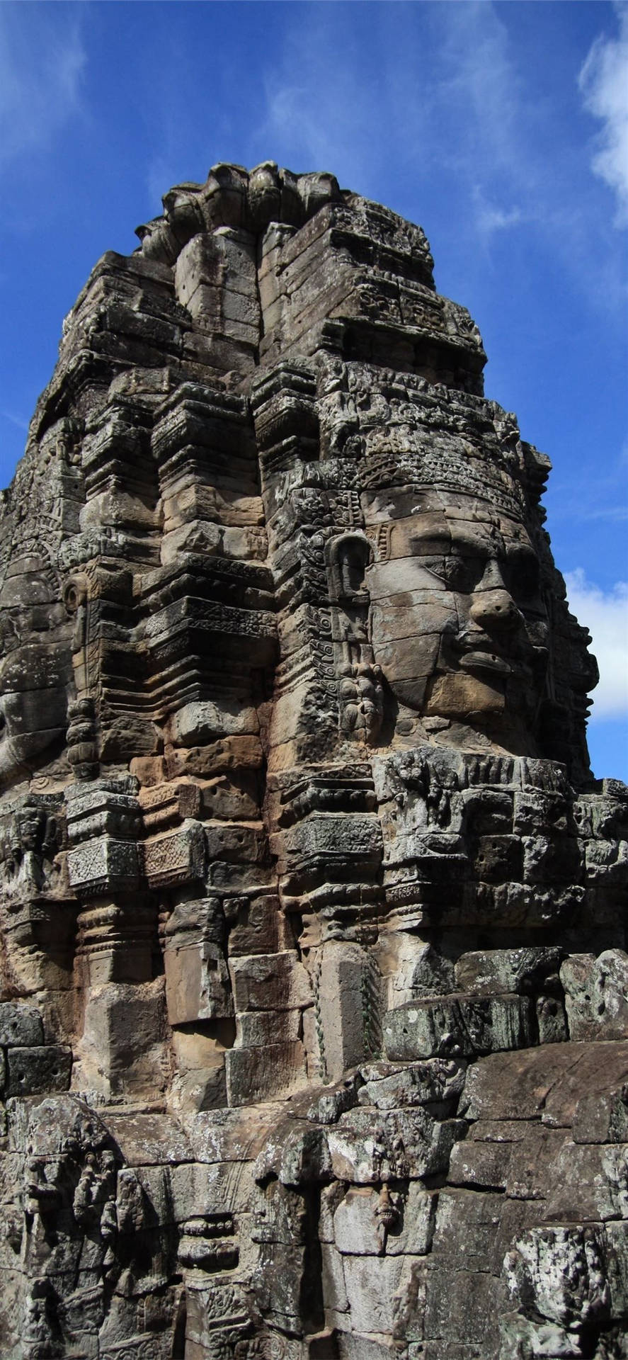 Architekturund Riesiges Steingesicht In Angkor Wat Wallpaper