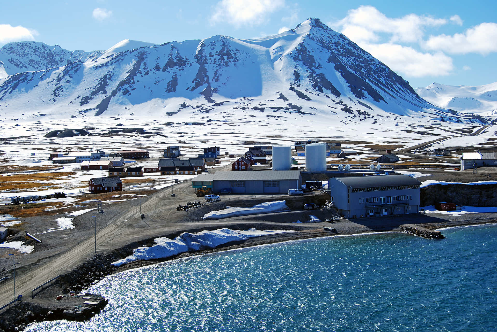 Arctic Coastal Village Snowy Mountains Wallpaper