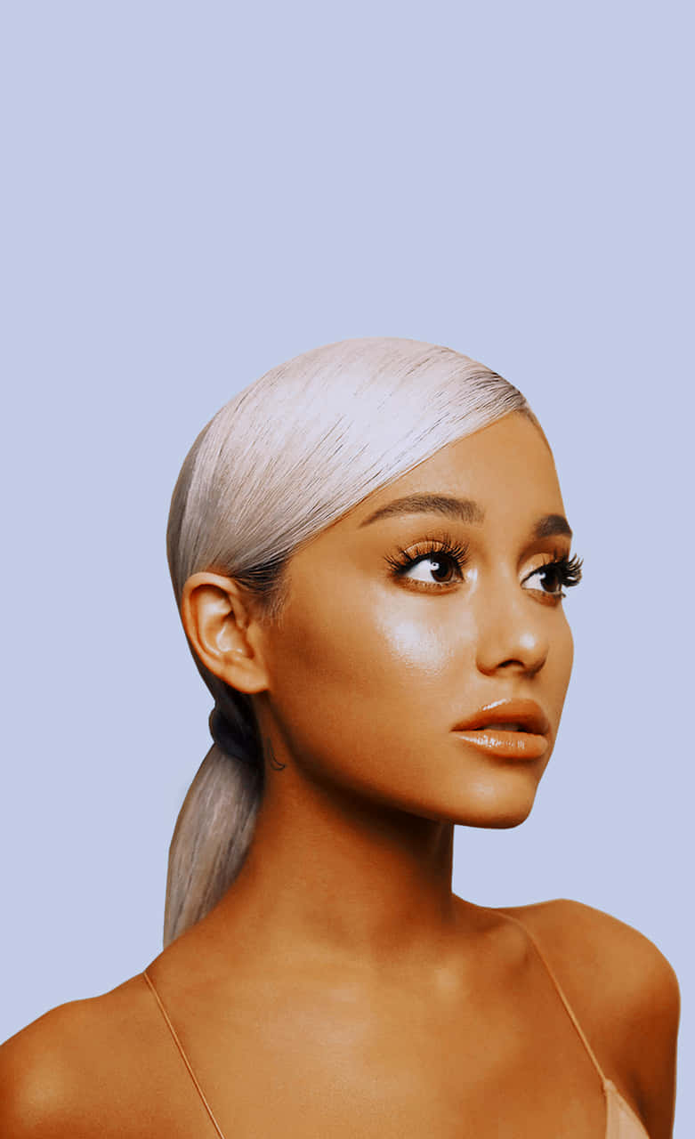 Ariana Grande surrounded by a bold neon aesthetic Wallpaper