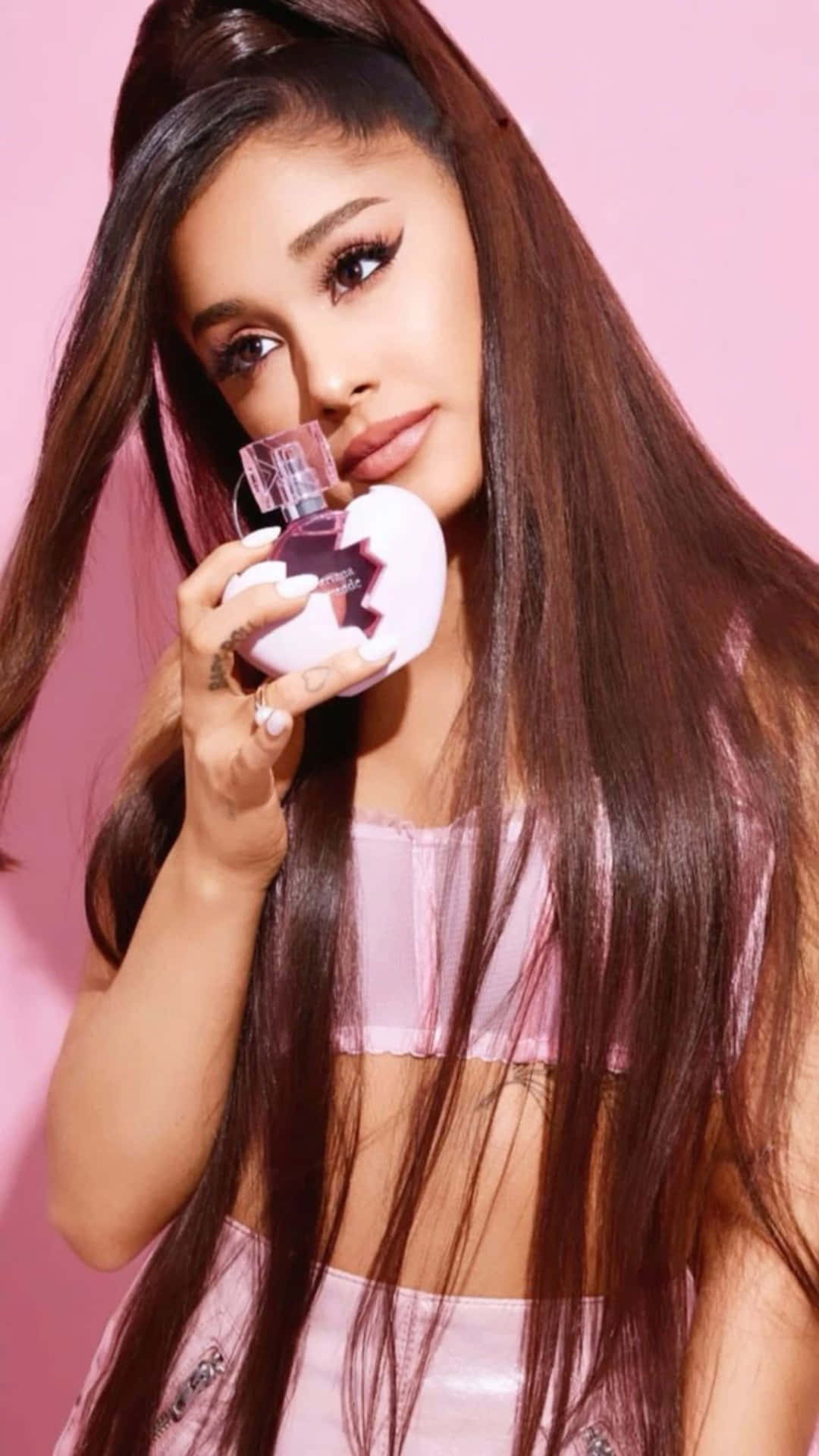 Ariana Grande Pink Perfume Promo Wallpaper