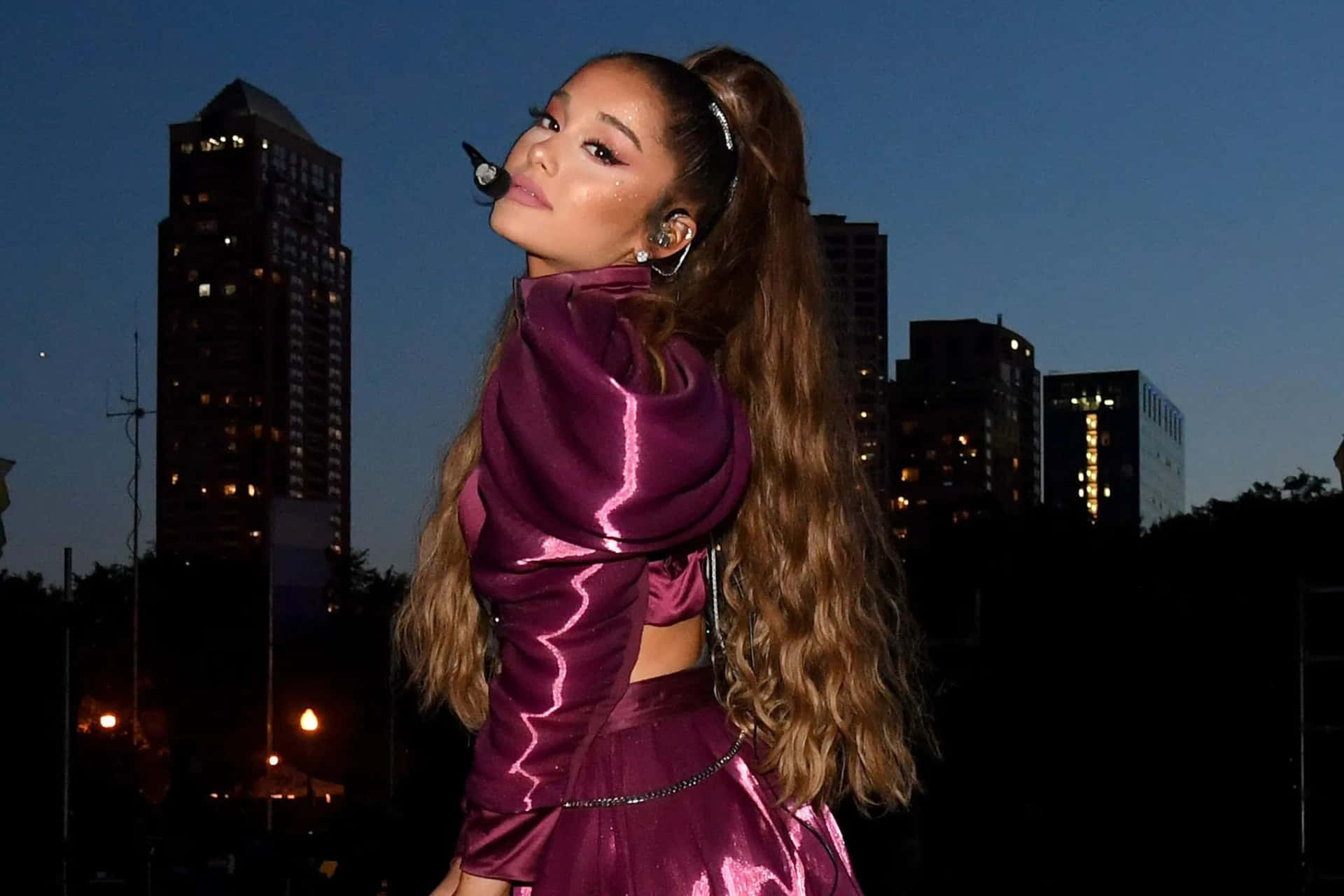 Ariana Grande Purple Outfit Performance Wallpaper