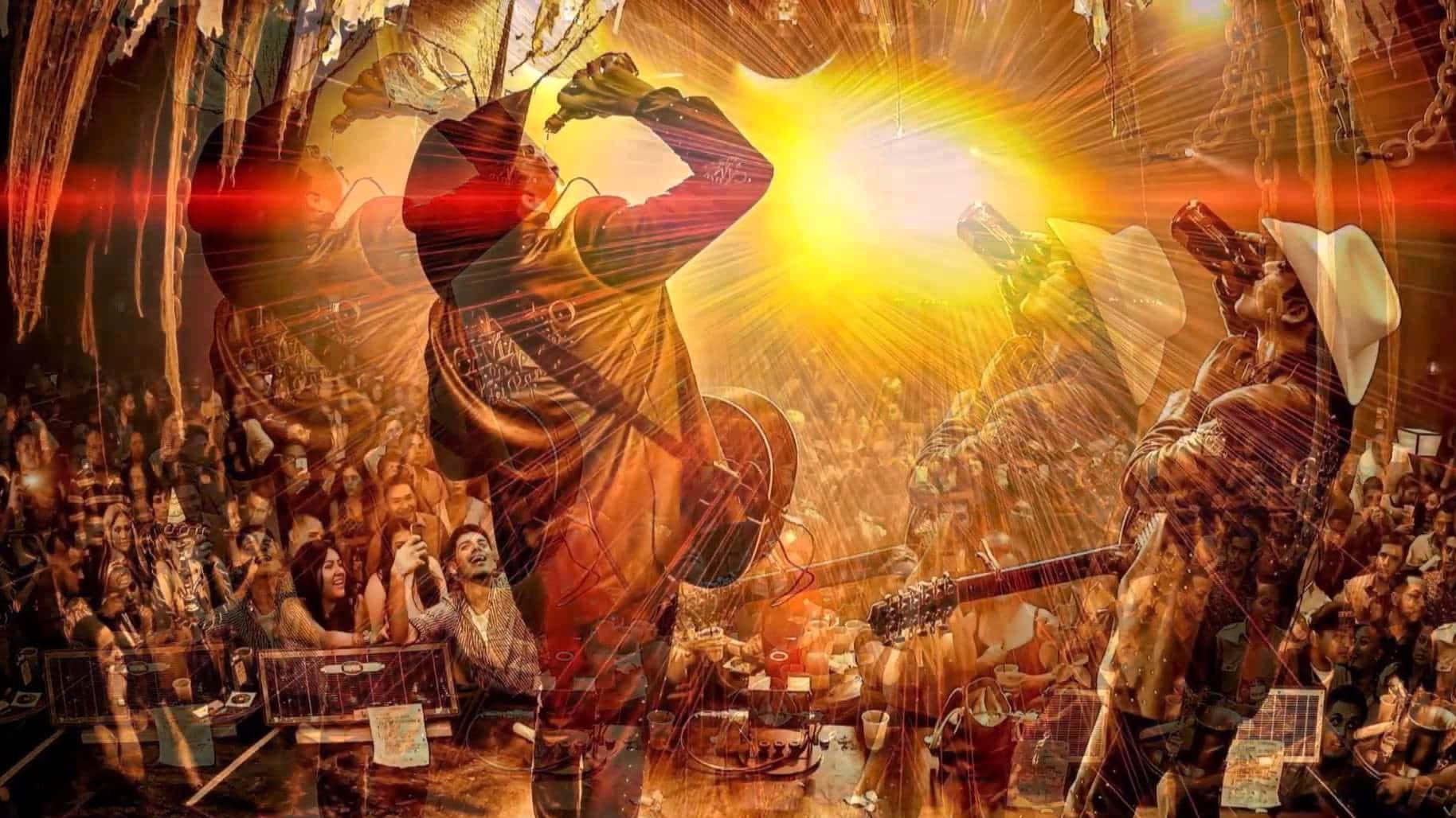 A Man Is Playing Guitar In Front Of A Crowd Wallpaper