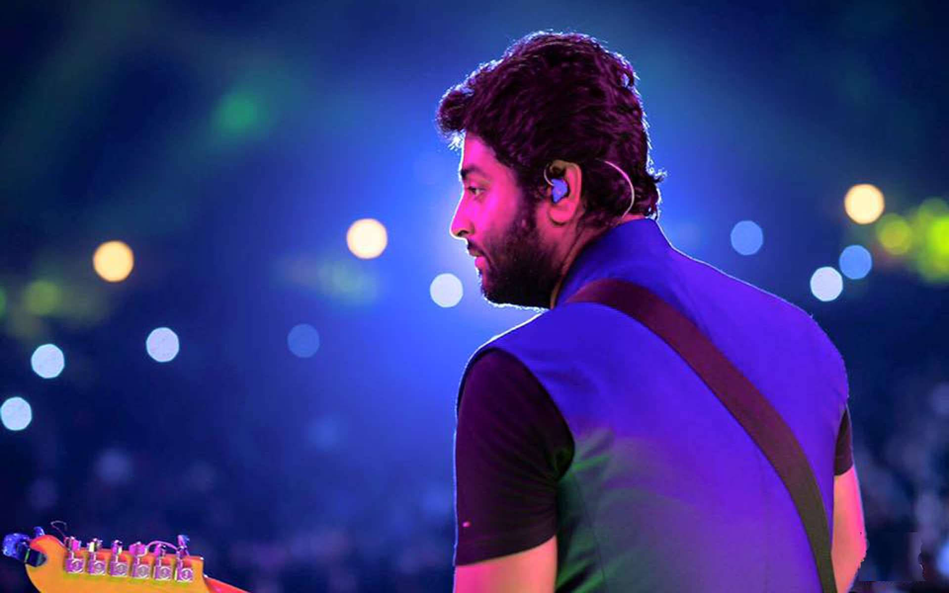 Arijit Singh Indian Singer Guitar Performance On Stage Background