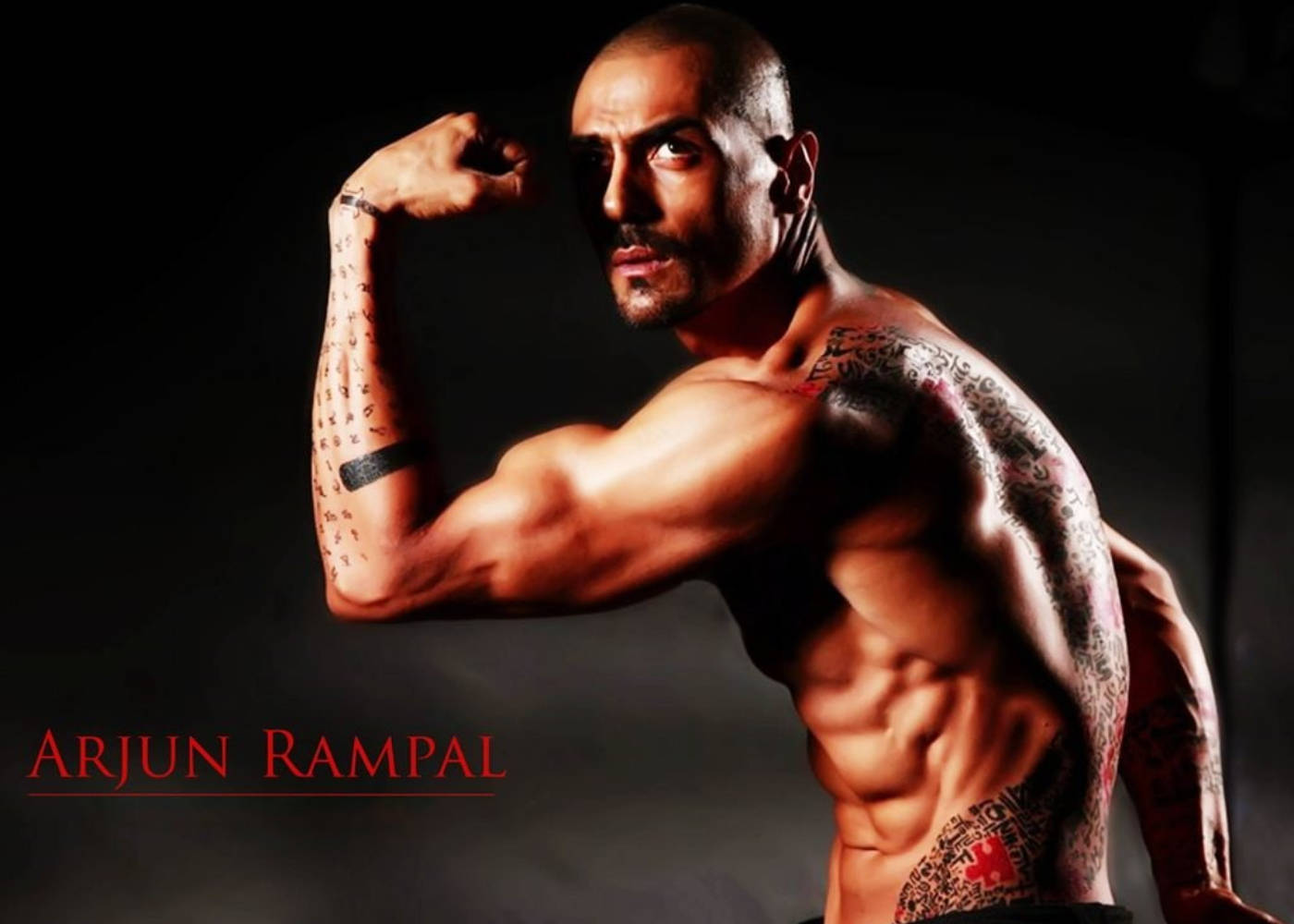 Arjun Rampal Flexing His Muscles Wallpaper