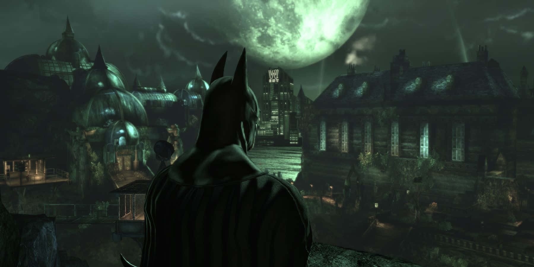 Chilling Nighttime View of Arkham Asylum Wallpaper