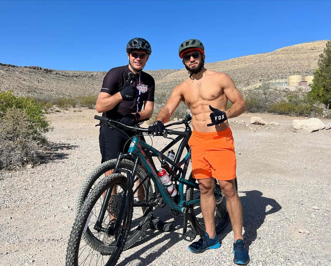 Arman Tsarukyan With Friend And Bikes Background