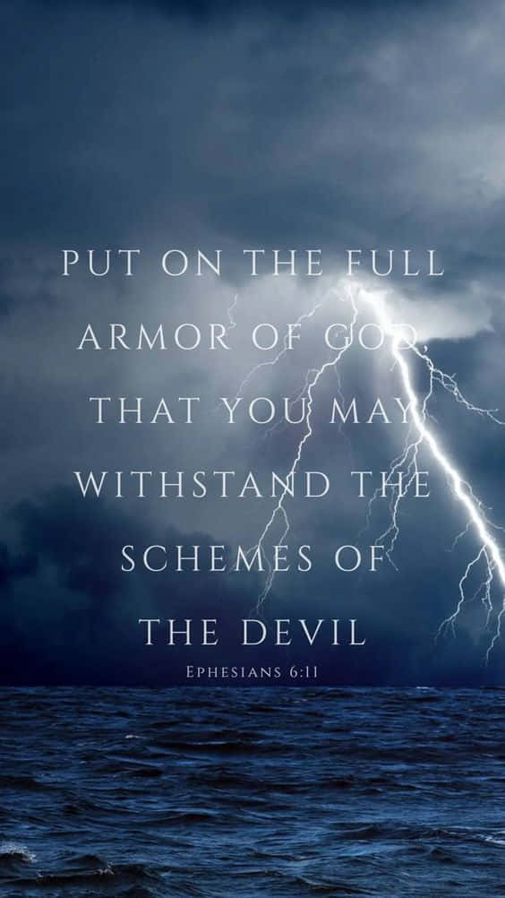 Et lyn med ordene 'tag på den fulde rustning af Gud, så du kan stå imod Djævelens planer. Wallpaper
