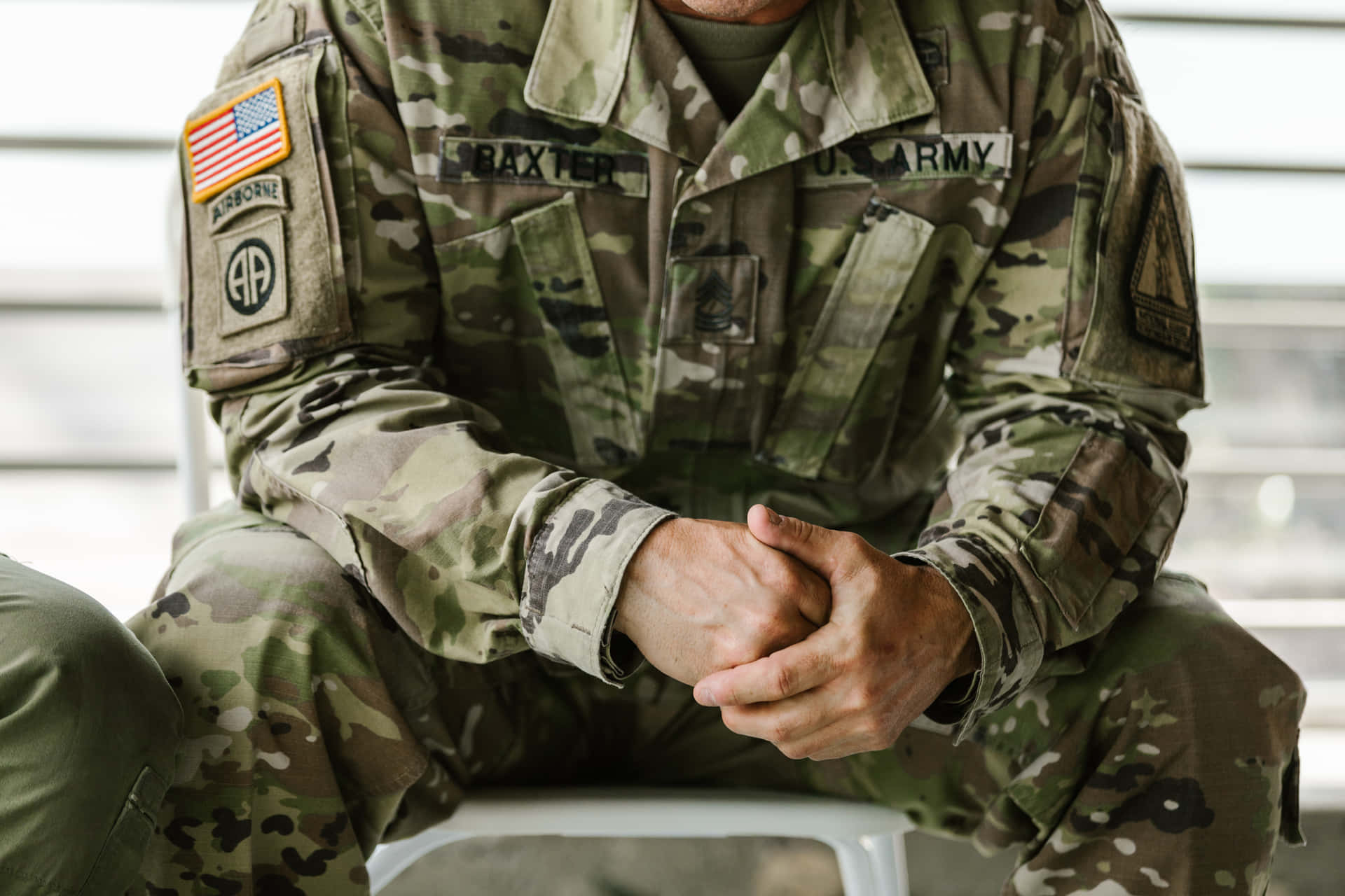 Army Man Sitting Uniform Wallpaper