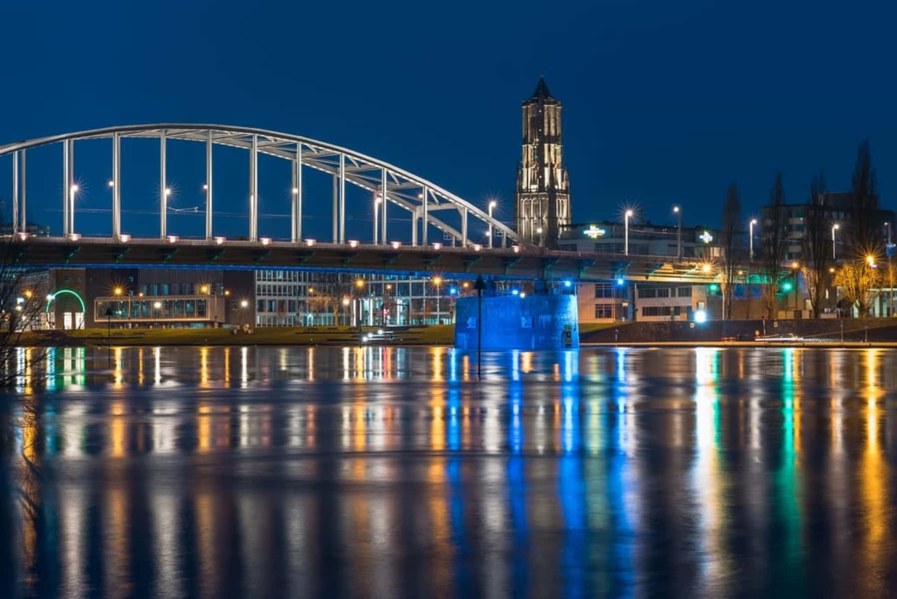 Download Arnhem Bridge Night Reflections Wallpaper | Wallpapers.com