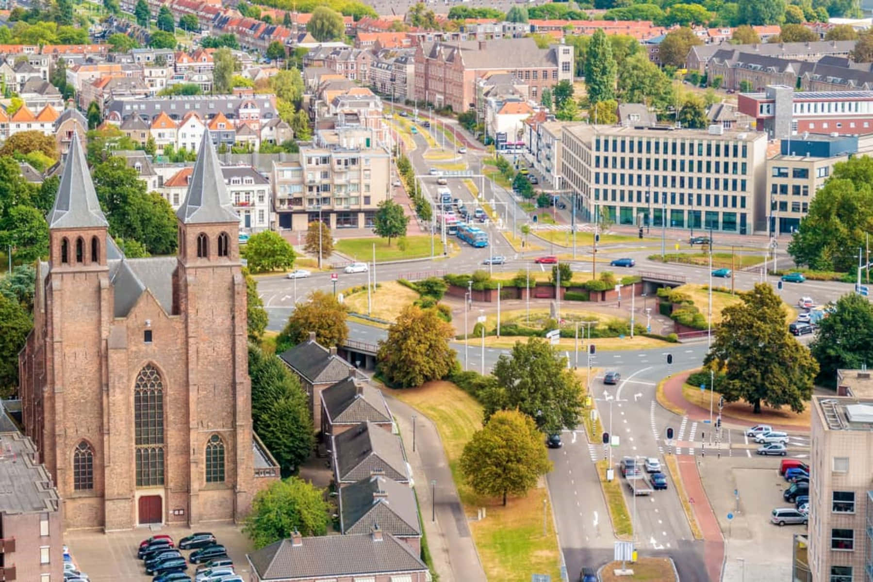 Download Arnhem Cityscapewith Historic Church Wallpaper | Wallpapers.com