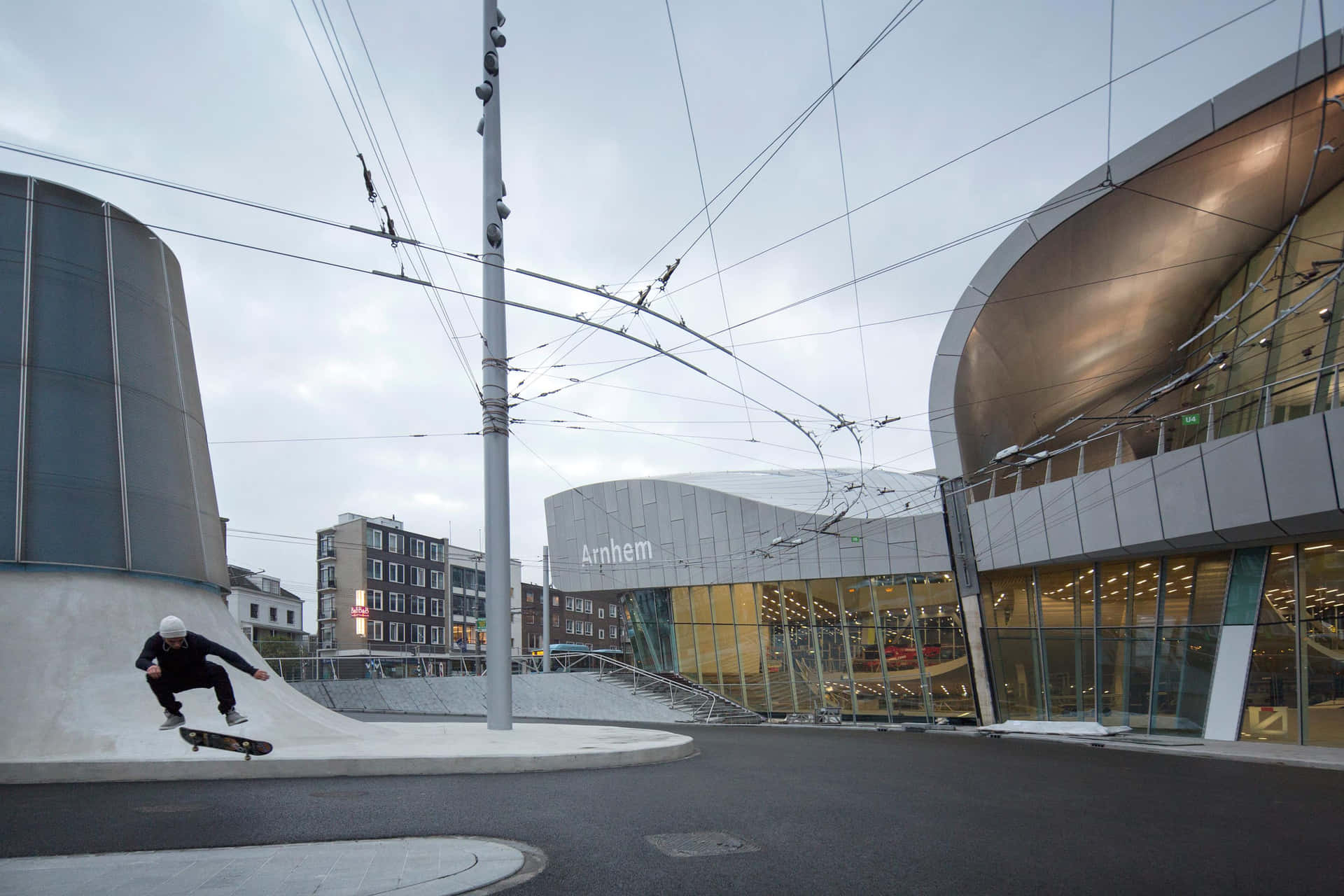 Arnhem Skateboarding Near Modern Architecture Wallpaper