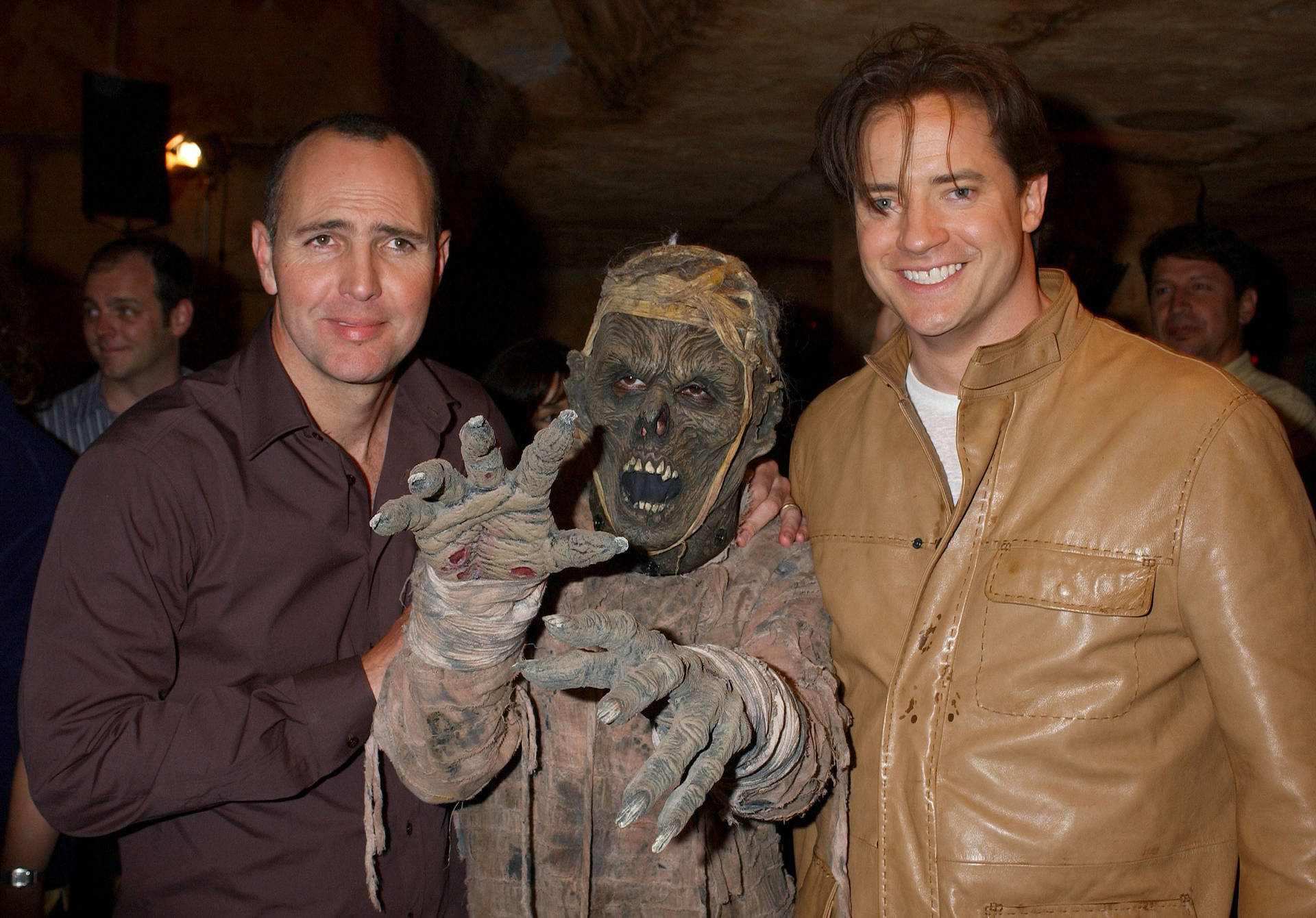 Arnold Vosloo with 'The Mummy' Memorabilia in Hand Wallpaper