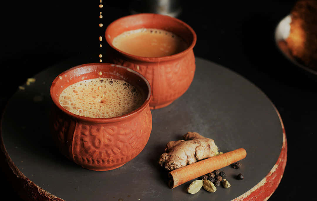 Aromatic Indian Chai Tea In A Traditional Handcrafted Cup Wallpaper
